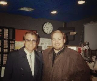 Barrett with a guest at the radio station